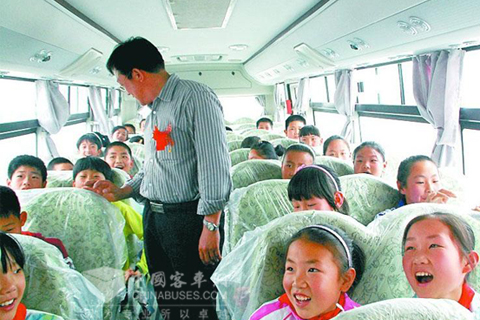 The Pupils are sitting in the New American Type "Big Nose" School Bus